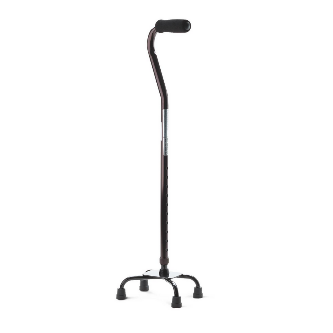 The Medline Quad Cane with Small Base, featuring a black ergonomic handle and skid-resistant rubber tips on four feet, offers reliable weight-bearing support and stands upright on a white background.